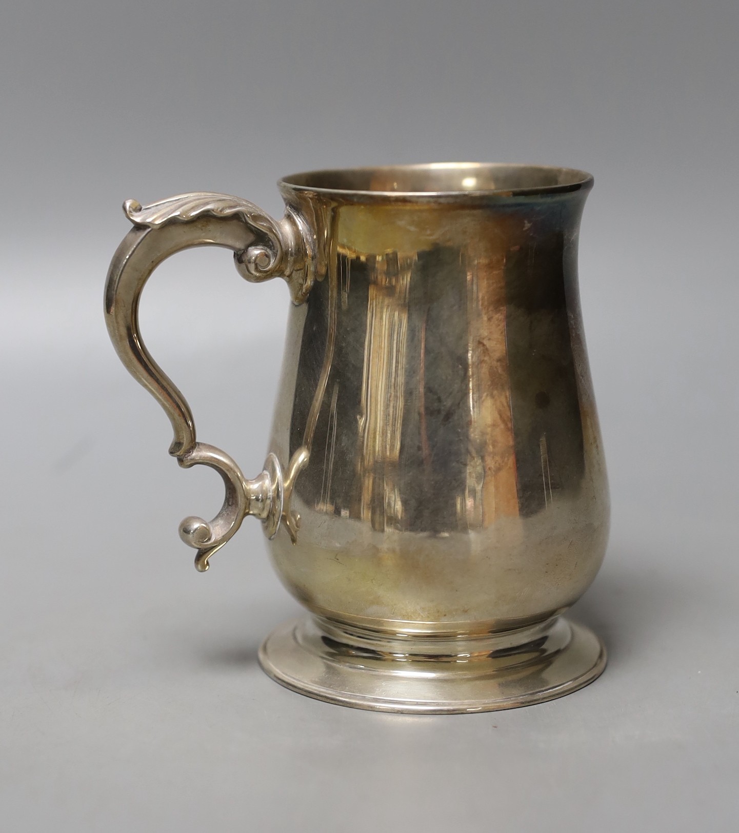 A late George II silver baluster mug, Ebenezer Coker, London, 1759, 10.5cm, 226 grams.